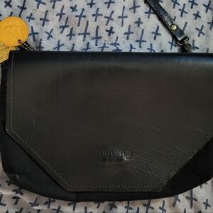 R. RIVETER Black Canvas Leather Flap Clutch Crossbody  Excellent used condition.